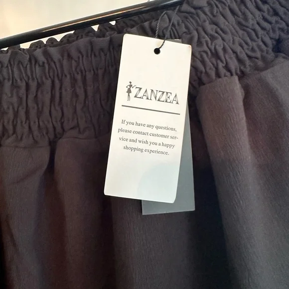 ⭐️NWT Black off the shoulder dress with ruffle sleeves and hem - Picture 4 of 8